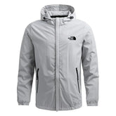 St. Martin Co TNF Pale Grey Hooded Shell Jacket — front view