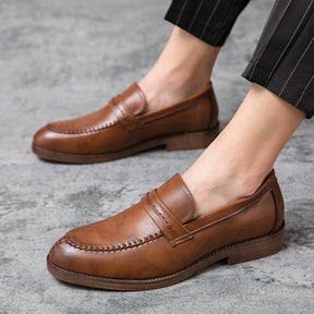 St. Martin Co Tan Moccasin-Stitch Penny Loafer — back view