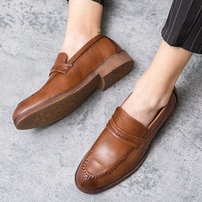 St. Martin Co Tan Moccasin-Stitch Penny Loafer — side view