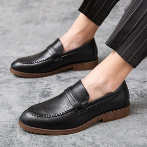 St. Martin Co Tan Moccasin-Stitch Penny Loafer — detail view